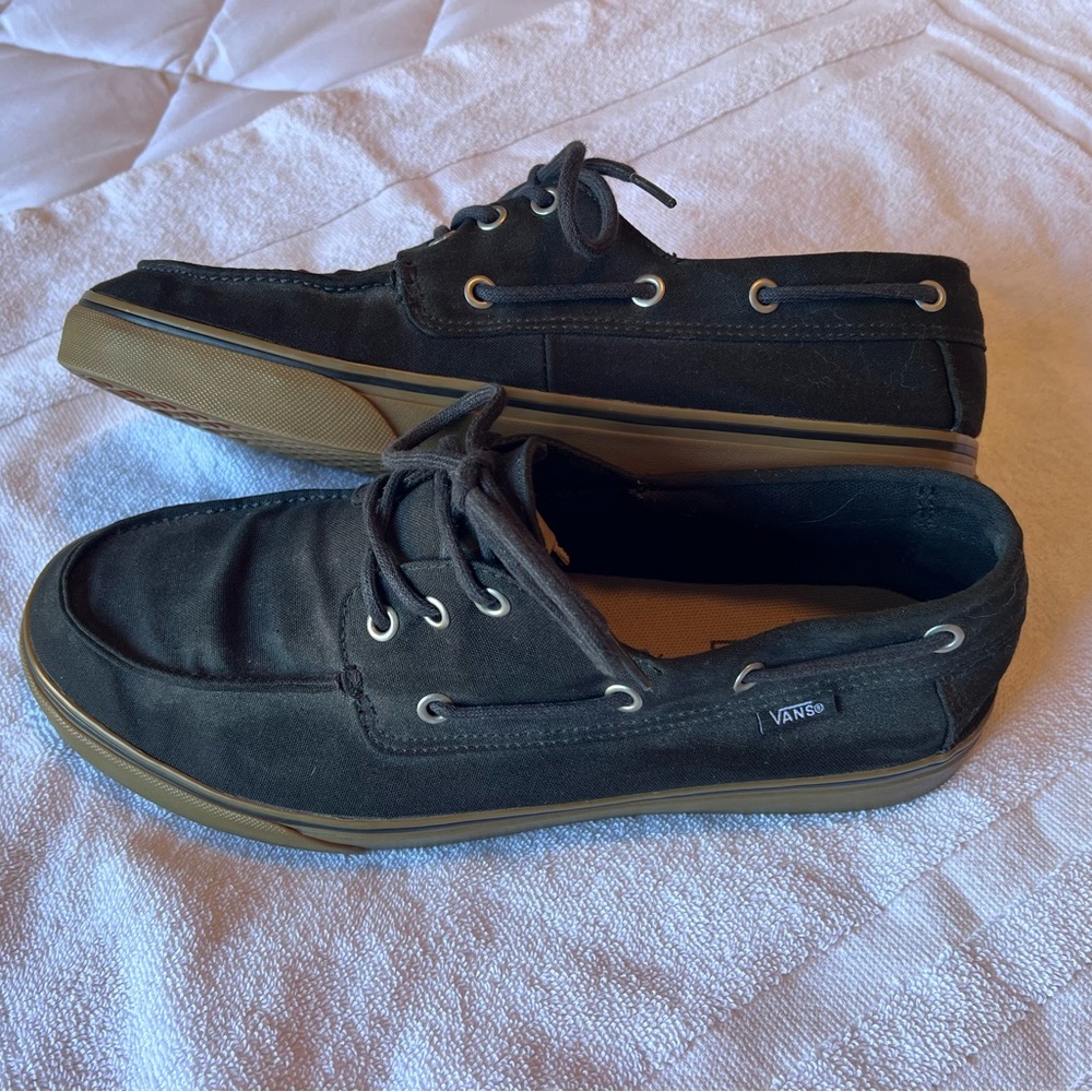Vans.  Black w/ gum bottom.  Men’s 11.   Lace up boat style shoe.  Great shape